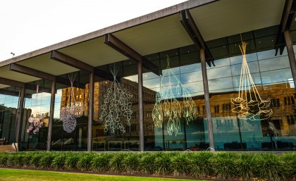Art work visible in reflection of windows at UQ Art Museum
